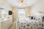 The master bedroom offers a king bed